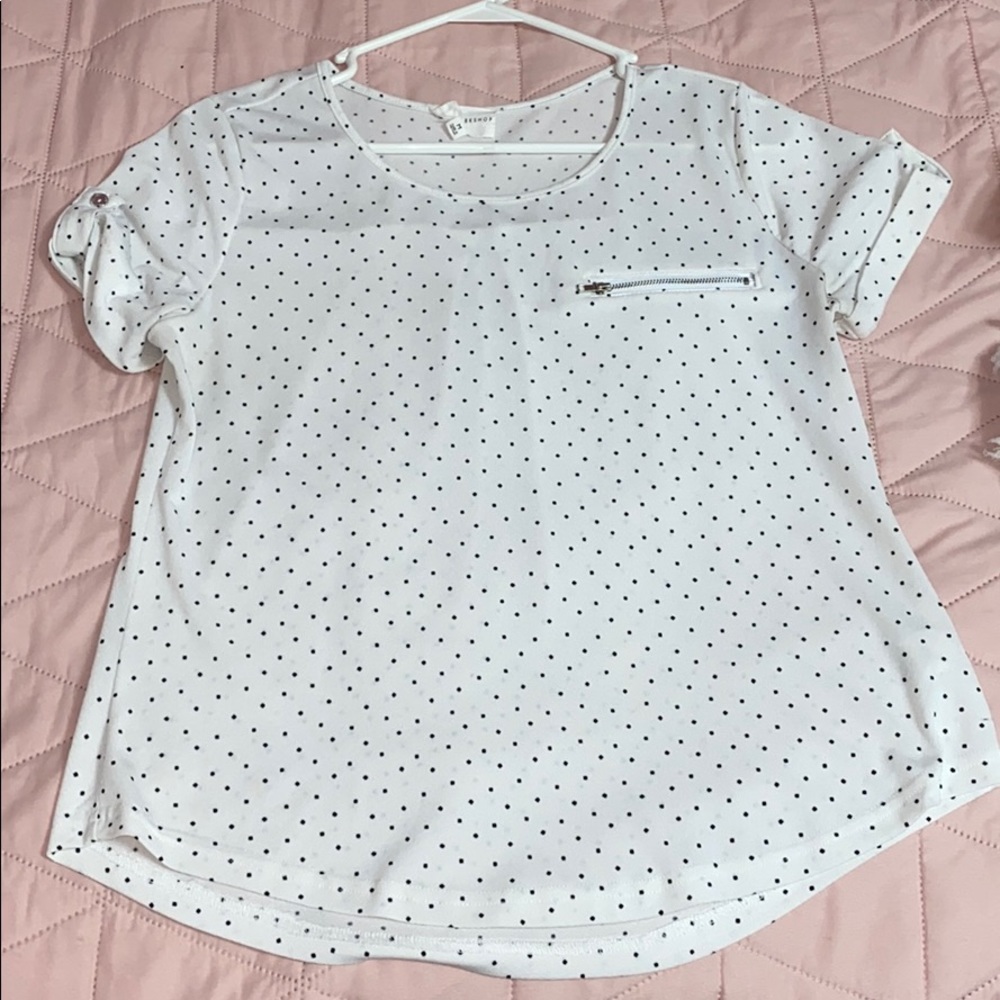 White with black spots